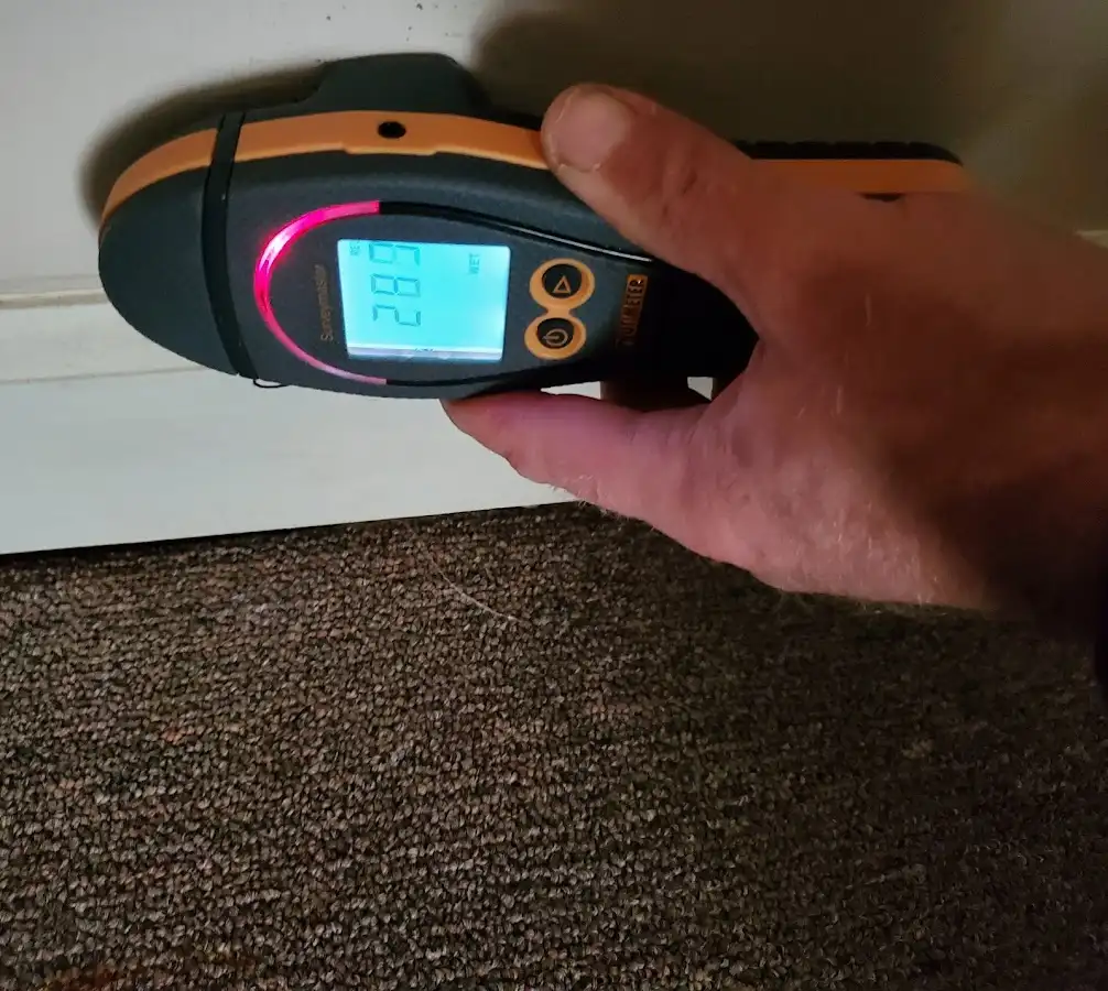 Moisture detection at baseboard during Storm Damage Restoration in Moses Lake